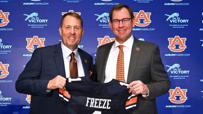 Auburn’s Hugh Freeze and AD John Cohen pose together